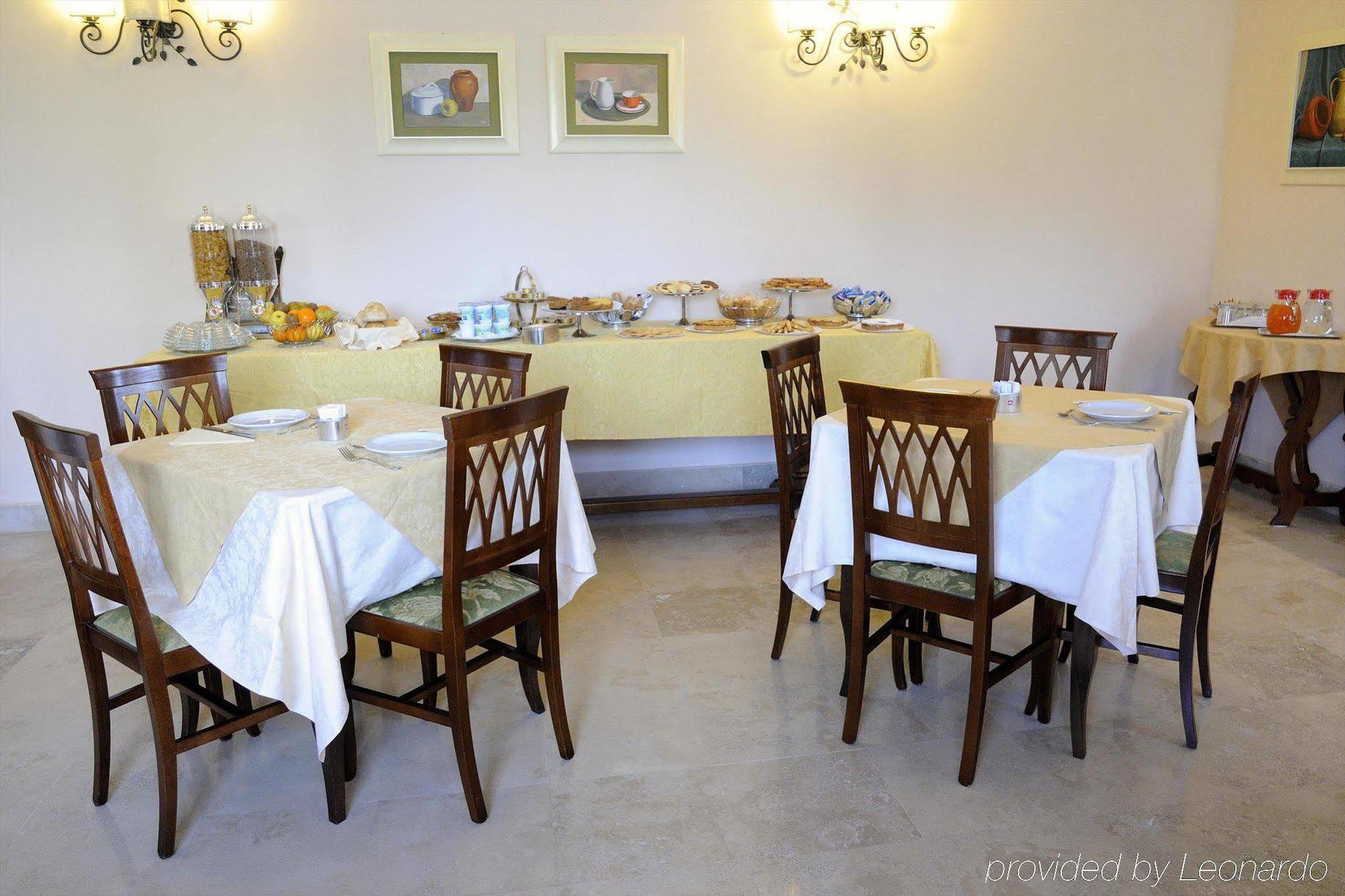 Altea Suites Pomezia Étterem fotó